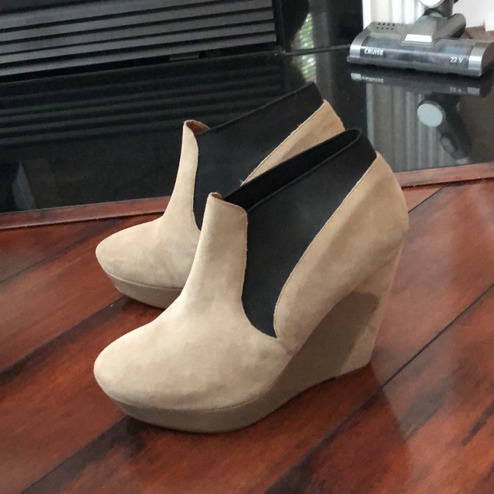 Tan and black booties